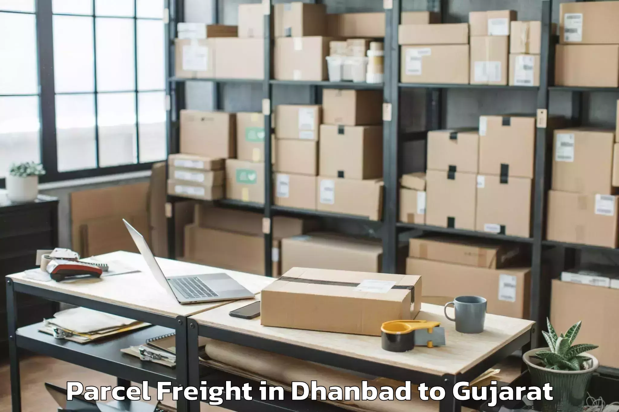 Book Your Dhanbad to Olpad Parcel Freight Today